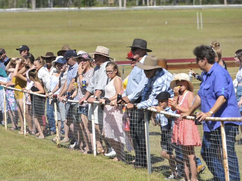 The crowd watches on at the Calliope Races on Boxing Day, 2017.