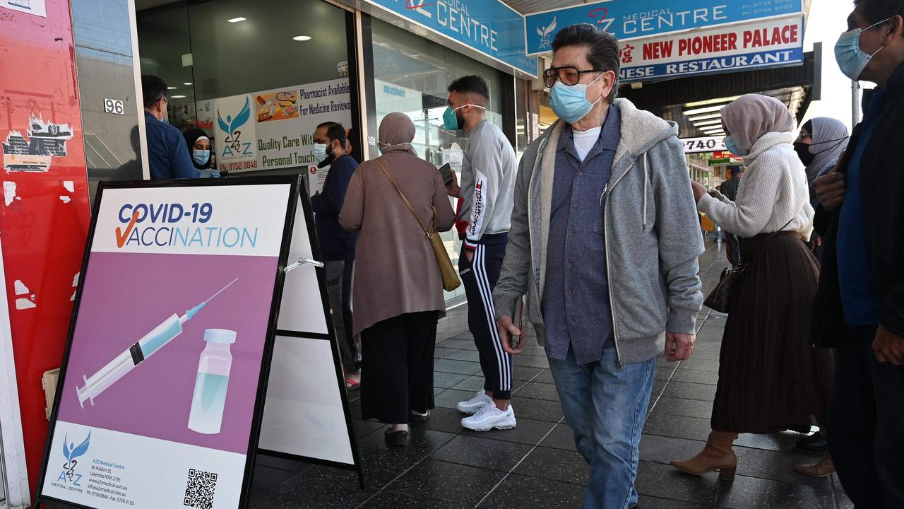 Residents queue up outside a pharmacy for a Covid-19 vaccination in western Sydney on July 30. Picture: Saeed Khan/AFP