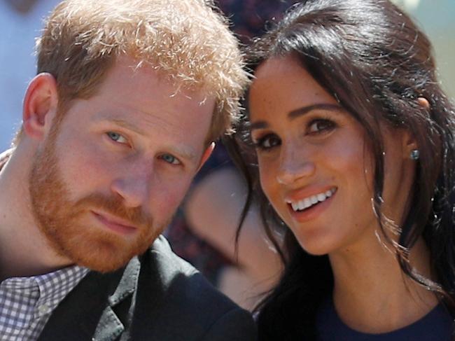 SYDNEY, AUSTRALIA - OCTOBER 19: Prince Harry, Duke of Sussex and Meghan, Duchess of Sussex watch a performance during their visit to Macarthur Girls High School on October 19, 2018 in Sydney, Australia. The Duke and Duchess of Sussex are on their official 16-day Autumn tour visiting cities in Australia, Fiji, Tonga and New Zealand. (Photo by Phil Noble - Pool/Getty Images)