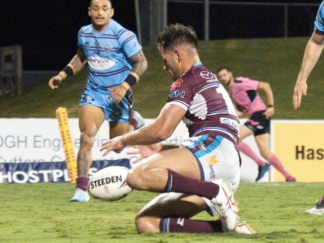 Cutters Sean Mullany crosses over to put the ball down in the 62nd minute against Capras in 2023. Picture: Marty Strecker