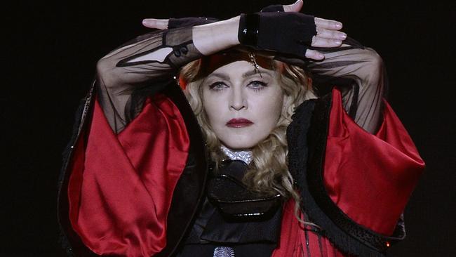In this Dec. 12, 2015 picture US singer Madonna performs one stage during a concert as part of her Rebel Heart Tour in Zurich, Switzerland. (Walter Bieri/Keystone via AP)