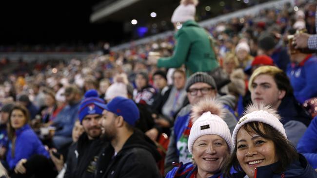 NRL fans wear Beanies for Brain Cancer at the Knights-Tigers clash. Photo: AAP Image/Darren Pateman