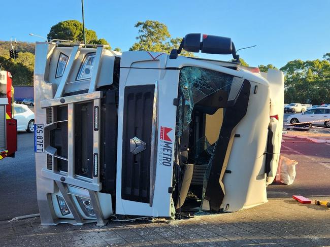 A truck has rolled at the base of the south-eastern freeway, with no reports of serious injury.