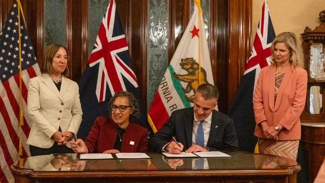 Premier Peter Malinauskas inks the deal with Tanya Bennett (right), Consul-General of Australia in Los Angeles, Eleni Kounalakis (left), Lieutenant Governor of California, and signing the document is Liane Randolph, California Air Resources Board Chair. Picture: Supplied