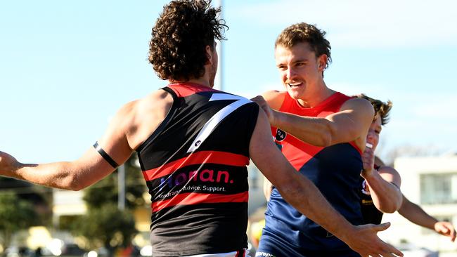 VAFA: Old Brighton and Old Xaverians players get acquainted. Picture: Josh Chadwick