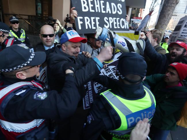 Anti-racism protesters clash with supporters of the far-right group outside court. Picture: David Crosling