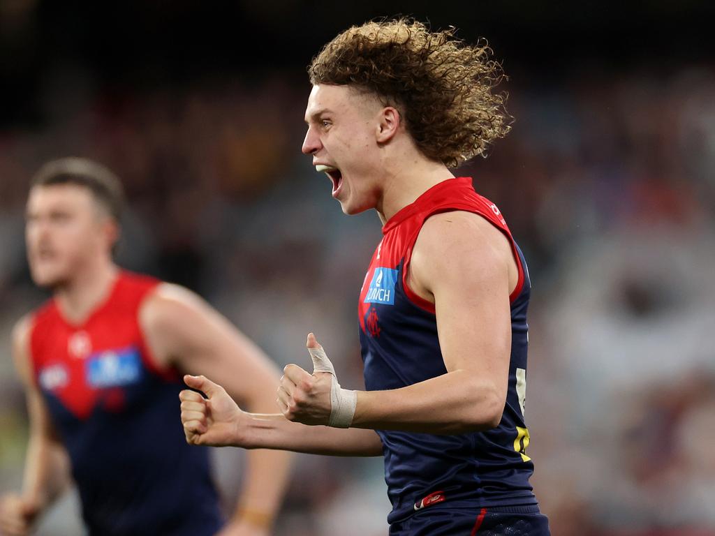 Koltyn Tholstrup of the Demons celebrates kicking a goal against Essendon. Picture: Kelly Defina/Getty Images.