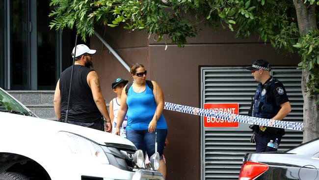 Forensic crime scene police on the scene of a police involved overnight shooting in the underground carpark of the Solaire Apartments on the corner of Ferny Avenue and Cypress Avenue, Surfers Paradise Photo: David Clark