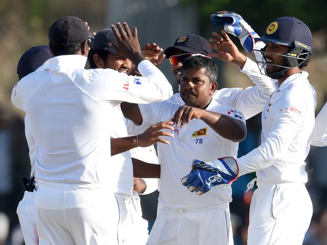 Spinner Rangana Herath celebrates another Australian wicket. Picture: AFP