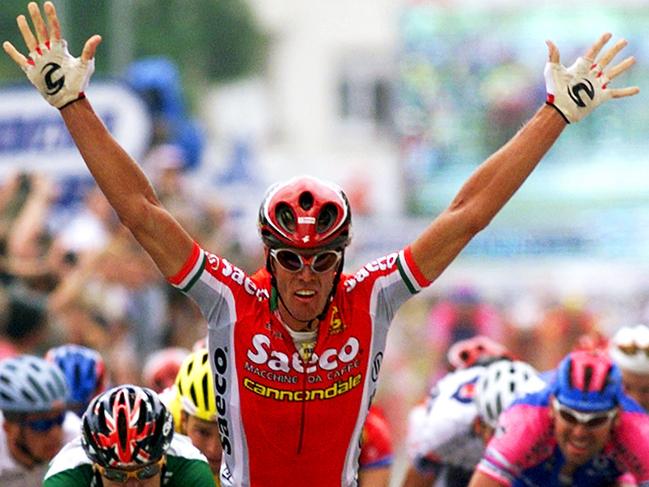 Italian cyclist Mario Cipollini crossing line to win the seventh stage of Tour de France.