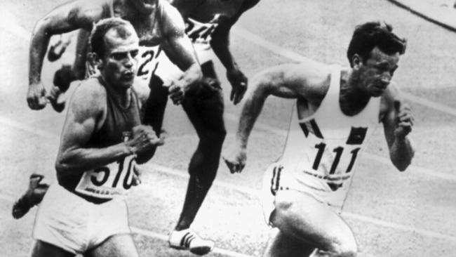 Peter Norman sprints ahead in the 200m semi final at the 1968 Mexico Olympics.