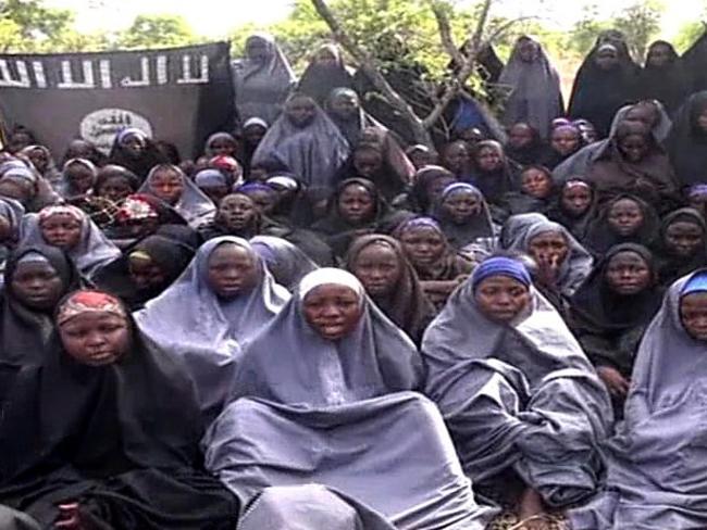 A screengrab taken on May 12, 2014, from a Boko Haram video of some of the captured girls. AFP PHOTO / BOKO HARAM