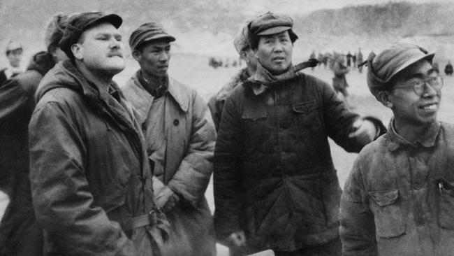 Mao Zedong, second from right, talks with Associated Press correspondent John Roderick in Yanan in 1946.