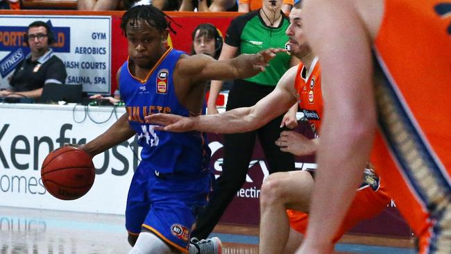 Tamuri Wigness drives from the perimeter in the National Basketball League (NBL) pre season match between the Cairns Taipans and the Brisbane Bullets, held at Early Settler Stadium, Manunda. PICTURE: BRENDAN RADKE.