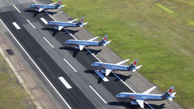 Jetstar planes on the tarmac at Sydney airport because of the coronavirus shutdown. John Feder/The Australian