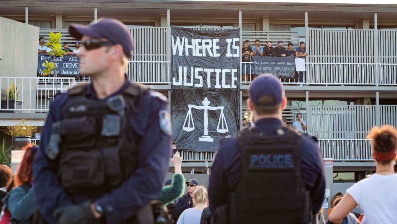 Police charge 37 protesters over Bris refugee rally