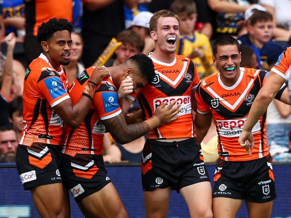 Wests Tigers celebrate a try. Picture: NRL Photos