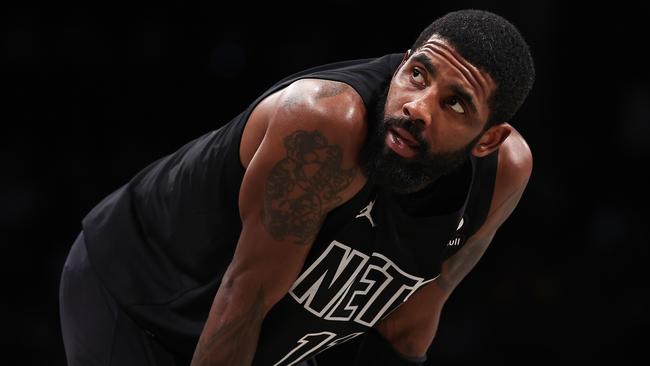 NEW YORK, NEW YORK - OCTOBER 31: Kyrie Irving #11 of the Brooklyn Nets looks on during a break in the action during the fourth quarter of the game against the Indiana Pacers at Barclays Center on October 31, 2022 in New York City. NOTE TO USER: User expressly acknowledges and agrees that, by downloading and or using this photograph, User is consenting to the terms and conditions of the Getty Images License Agreement. (Photo by Dustin Satloff/Getty Images)