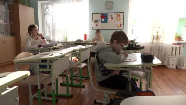 Kyiv schools persevere through attacks and power cuts