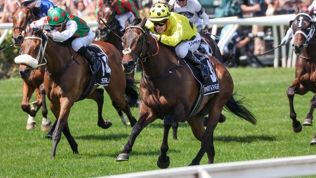 Mark Zahra urges Without A Fight to the line in the 2023 Melbourne Cup. Picture: George Sal / Racing Photos