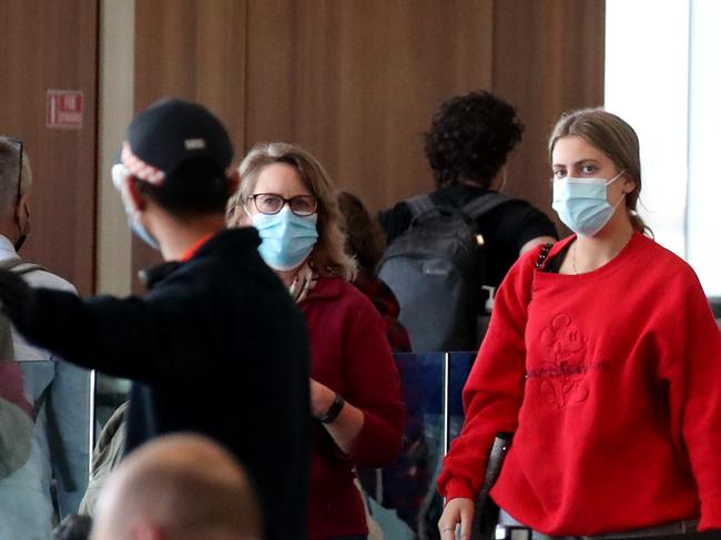 ADELAIDE, AUSTRALIA - NewsWire Photos 23rd June 2021: Passengers wearing masks at the Adelaide Airport. Picture: NCA NewsWire / Kelly Barnes