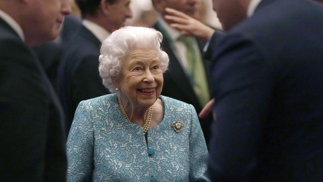 Britain's Queen Elizabeth II and Prime Minister, Boris Johnson greet guests at Windsor Castle to mark the Global Investment Summit in Windsor. Picture: Alastair Grant / Getty