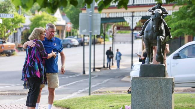 People leave flowers at the Royal Daylesford Hotel. Five people are dead following a crash at the The Royal Daylesford Hotel. The car crashed into the beer garden of the Vincent Street venue about 6.05pm last night Five people were killed and multiple people injured. Picture: Brendan Beckett