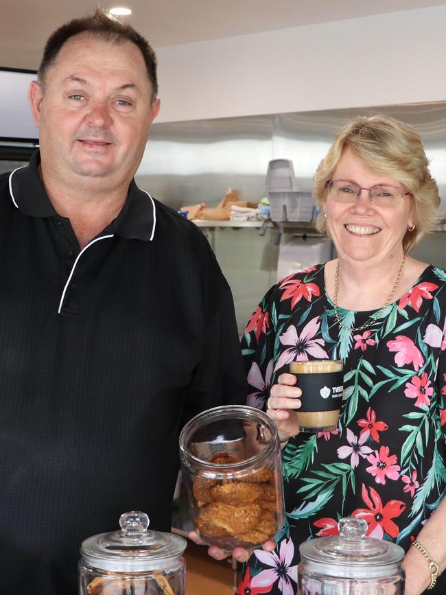 Brett Street Cafe Supervisor Allan Gibson gives Trish Baldwin and Lisa Carruthers a taste of what's to come at the social enterprise cafe.