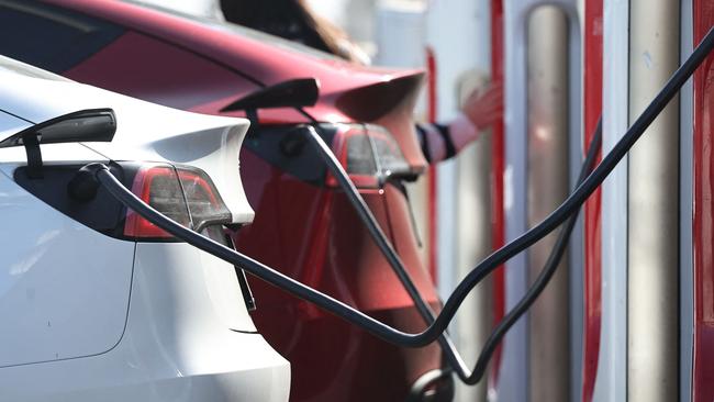 PASADENA, CALIFORNIA - SEPTEMBER 23: Tesla electric vehicles (EVs) recharge at a Tesla Supercharger station on September 23, 2024 in Pasadena, California. The California Air Resources Board announced that Californiaâs carbon dioxide emissions dropped 2.4 percent in 2022, even as the economy rebounded from the COVID-19 pandemic, primarily due to electric vehicle use and cleaner fuels.   Mario Tama/Getty Images/AFP (Photo by MARIO TAMA / GETTY IMAGES NORTH AMERICA / Getty Images via AFP)