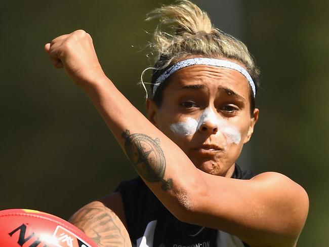 MELBOURNE, AUSTRALIA - MARCH 18:  Moana Hope of the Magpies handballs during the round seven AFLW match between the Collingwood Magpies and the Adelaide Crows at Olympic Park on March 18, 2018 in Melbourne, Australia.  (Photo by Quinn Rooney/Getty Images)