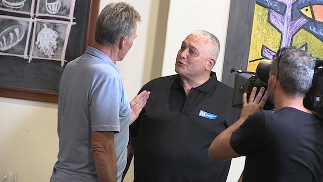 Screen shots of Sam Newman interview with Mick Gatto for The Footy Show.