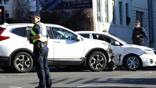 Police on the scene of a two-vehicle crash last month. Picture: ZAK SIMMONDS