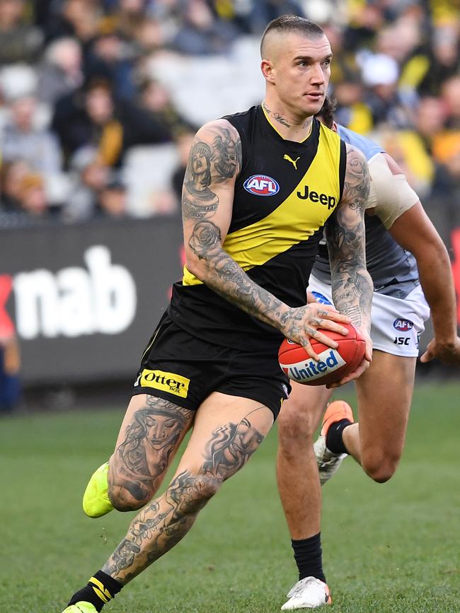 Dustin Martin in action for the Tigers during the Round 18 AFL match between Richmond and the Port Adelaide Power at the MCG in Melbourne. (AAP Image/Julian Smith)