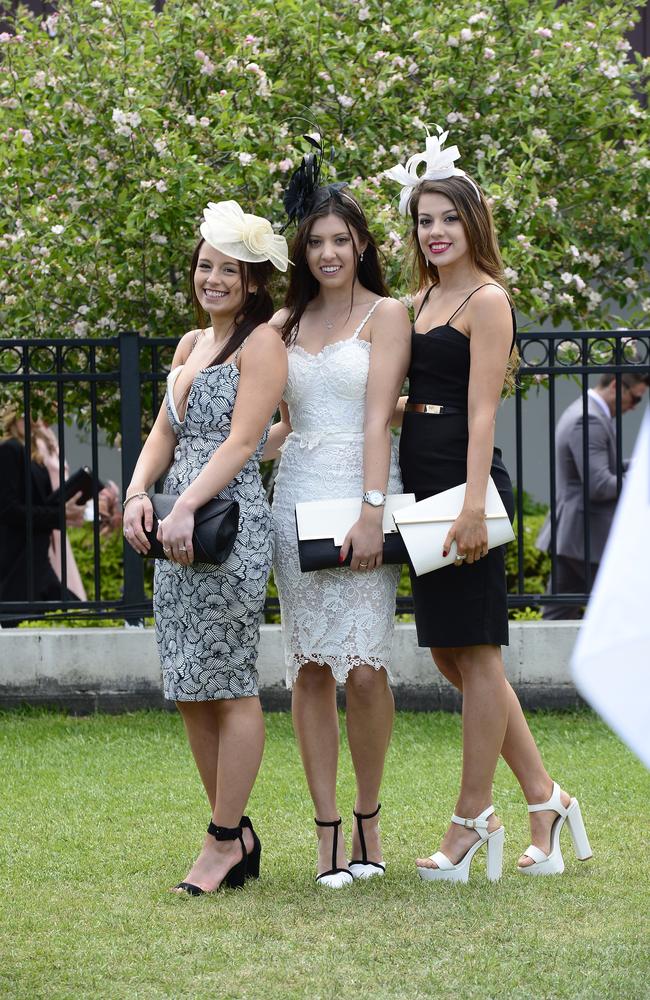 Kelsey Smith, Elis Ismailoglu and Taryn Logan at Flemington Racecourse on Derby Day 2014. Picture: Stephen Harman