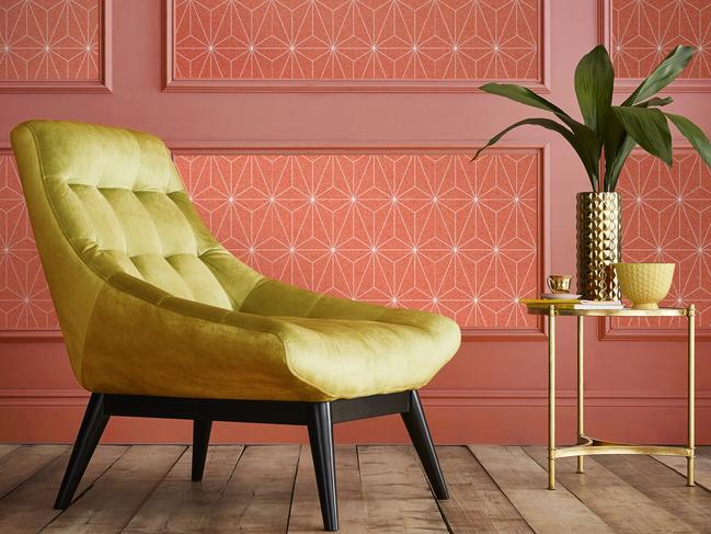 Bolder than peach and quieter than red, Living Coral is surprisingly easy to live with. Prism wallpaper and Strawberry Sundae paint from Graham &amp; Brown