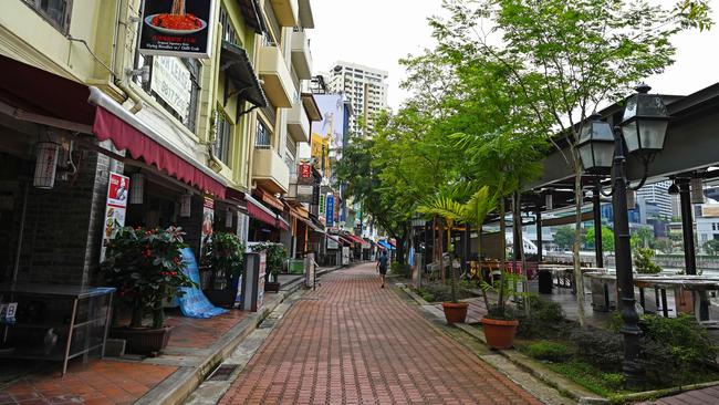 Boat Quay in Singapore is deserted on Wednesday as Covid restrictions bite. Picture: AFP