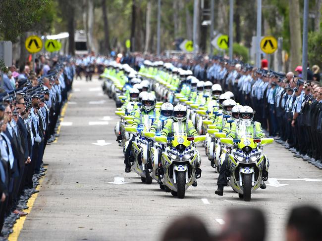 The funeral procession at the memorial service with full police honours for constables Rachel McCrow and Matthew Arnold at Brisbane Entertainment Centre. Picture: John Gass/NCA NewsWire