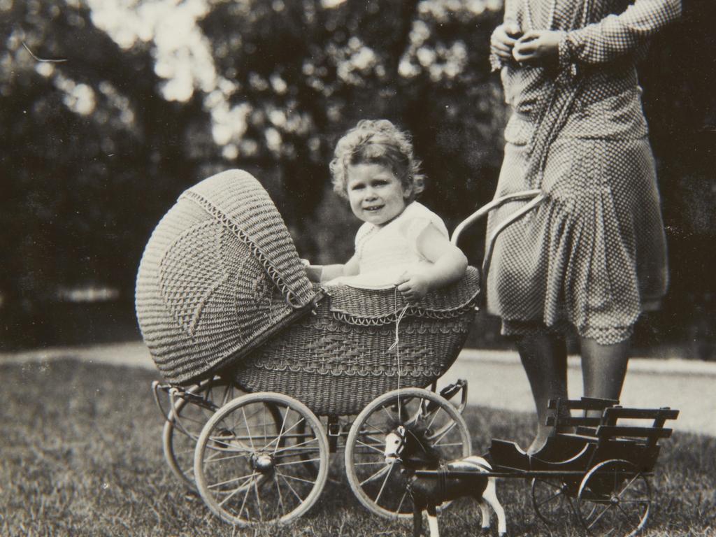 Princess Elizabeth sitting in a wicker pram in a photo dated May 1928 attributed to British King George VI, when Duke of York, released by the Royal Collection Trust in August 2013.