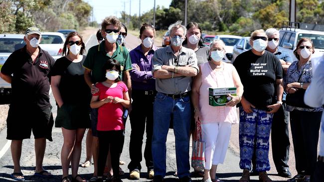 Angry Port Augusta residents confront Environment Minister Ian Hunter as he visits the site of Northern Power Station. Picture: Calum Robertson