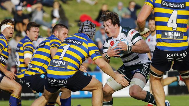 Sydney University in action against Warringah at the start of the season.