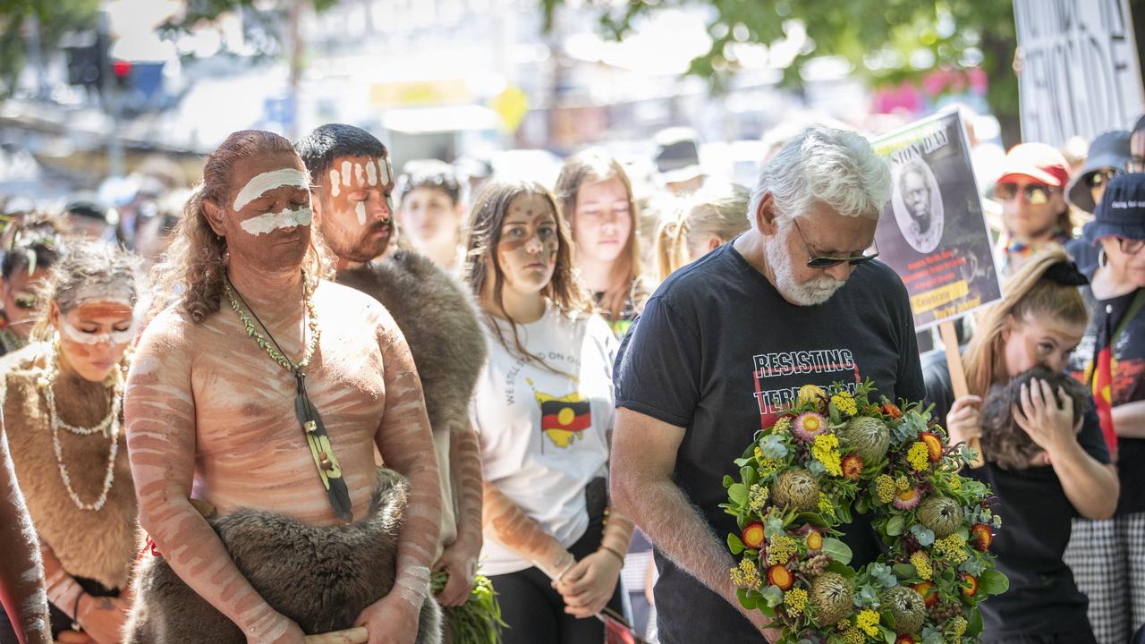 Rocky Sainty carries a wreath during the Invasion Day March and Rally at Hobart. Picture: Chris Kidd