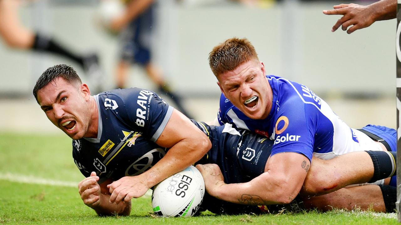 Reece Robson powers over the line for North Queensland.