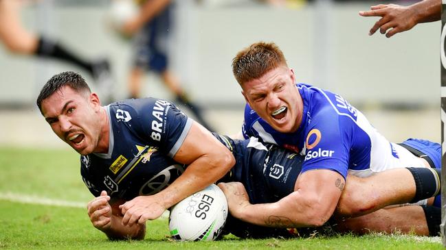 Reece Robson powers over the line for North Queensland.