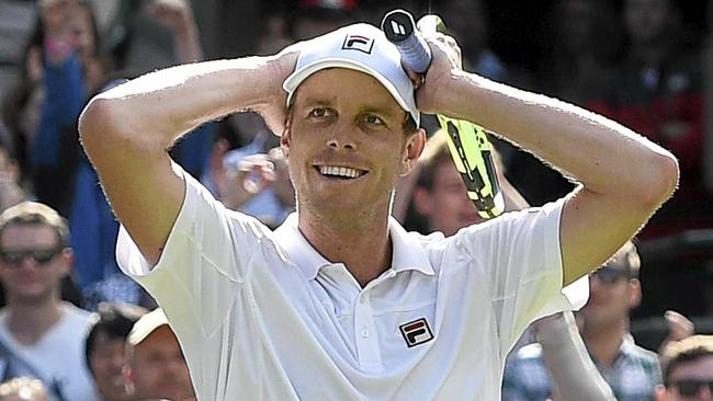 Sam Querrey of the US celebrates his win over Novak Djokovic. Picture: FACUNDO ARRIZABALAGA