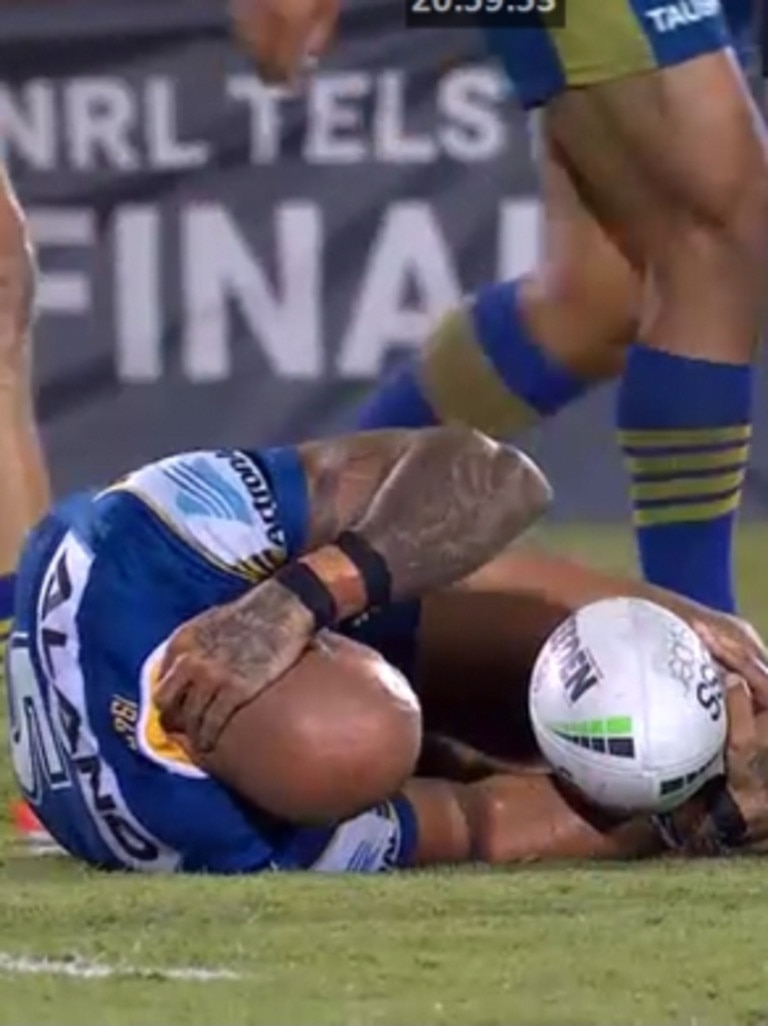 Blake Ferguson clutches his neck.