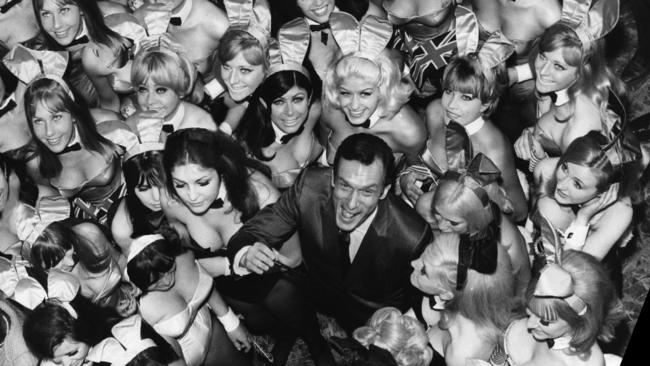 Playboy founder Hugh Hefner surrounded by Playboy Bunny Girls in photo from TV documentary program 'Sex in 69: Sexual Revolution in America', on History Channel.