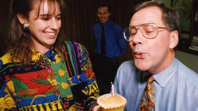 Then Opposition Leader Dean Brown celebrates one year in office, watched by secretary Steph Englehardt and press secretary Kevin Donnellan in 1993. Picture: File