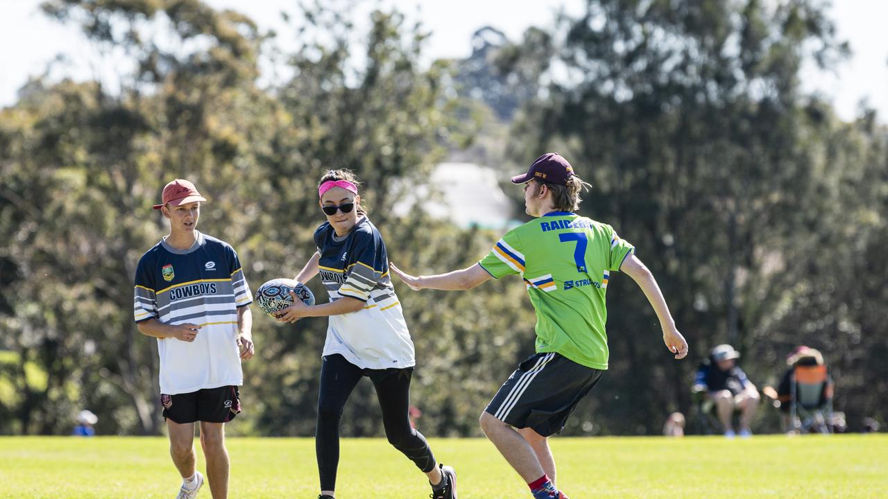 Cowboys Adeodata Dillon-Romano takes on Raiders Nicholas Winnett (right).