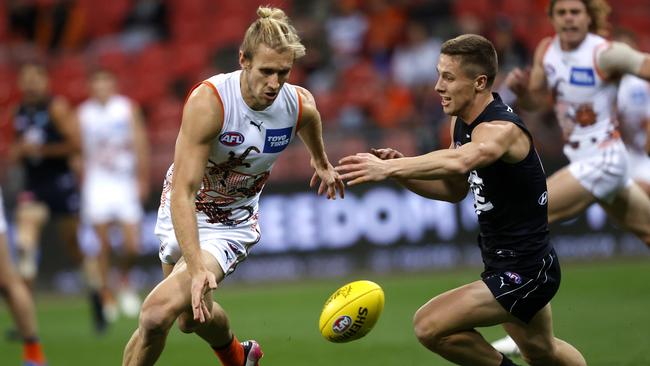 Giants defender Nick Haynes (left) has struggled with a stomach issue for the past month. Picture: Phil Hillyard