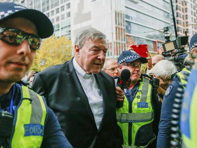 Cardinal George Pell, the most senior Catholic cleric to face sex charges, arrives at court in Melbourne, Australia, Wednesday, May 2, 2018. Pell, the most senior Vatican official to be charged in the Catholic Church sex abuse crisis, arrived Wednesday for an appearance in the Melbourne court where he will eventually stand trial on sexual abuse charges spanning decades. (AP Photo/Asanka Brendon Ratnayake)